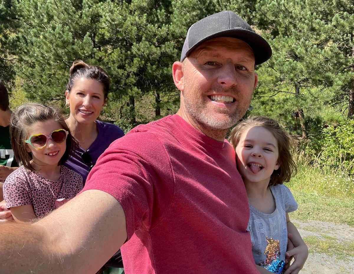 Dan Kennedy hiking with his family in the Colorado mountains